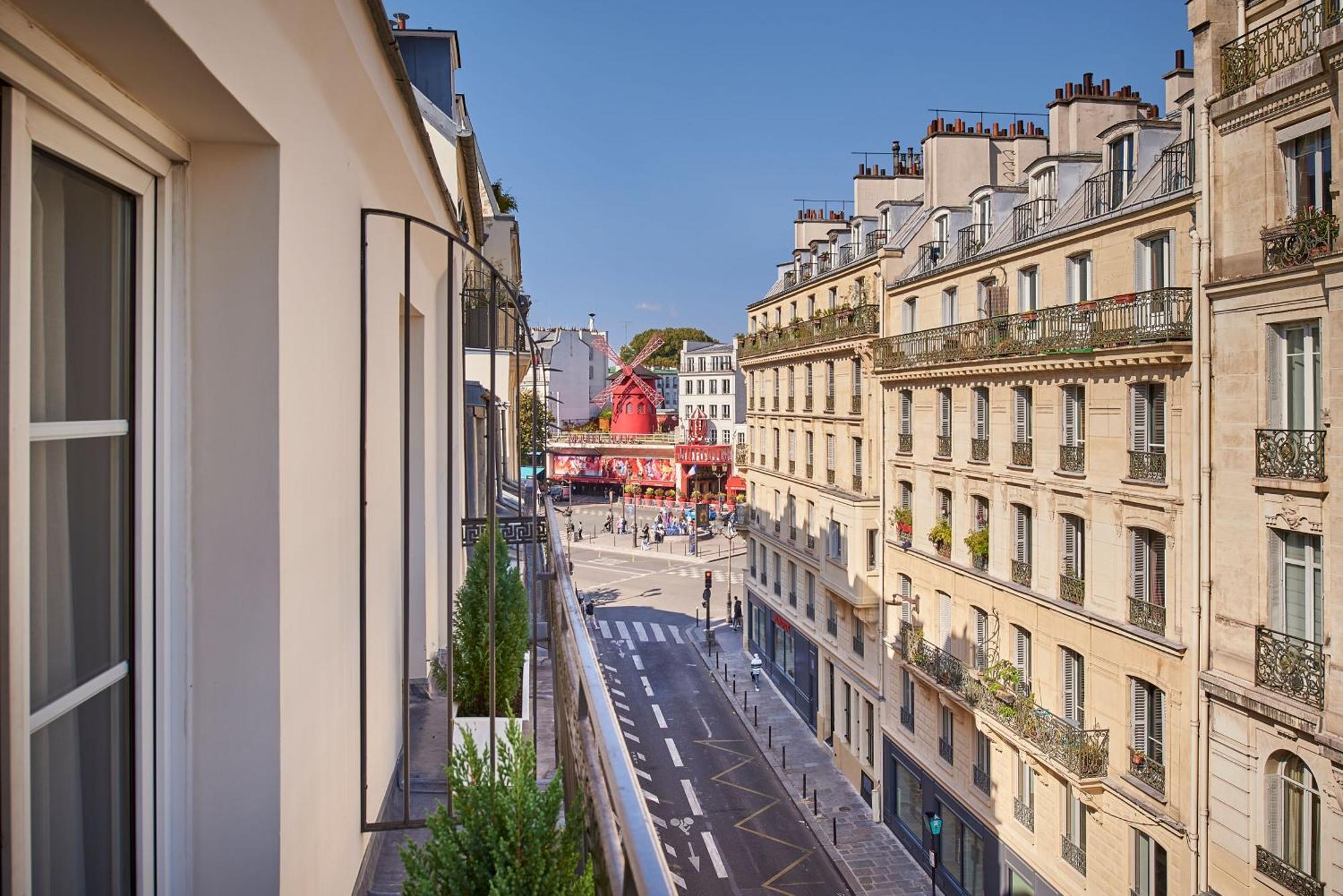 Hotel Moulin Plaza By Happyculture Paris Exterior photo